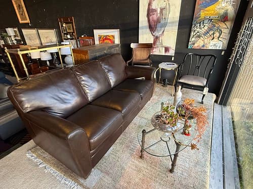 Natuzzi Italian Leather Sofa Modern Bark Top Grain Leather - $799
Kolka Steel and Glass Oval Cocktail Table - $229
Black Lacquer Arm Chair with Silver Fabric - $149