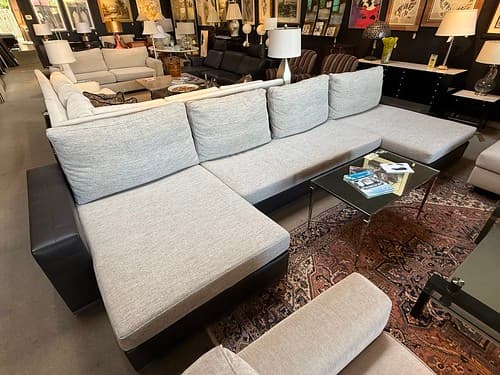 Adriana Hoyos Chaise Sectional with Side Table Mink Quilted Leather Oatmeal Woven - $3495
Modern Chrome and Mirror Cocktail Table - $279