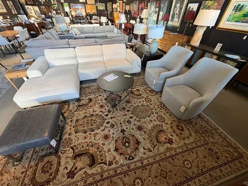 Modern Chaise Sectional Beige Fabric Bronze Legs - $498
Herman Miller Polygon Wire Cocktail Table Black - $499
Arhaus Boucle Swivel Lounge Chair Grey - $299
Moroni Grey Leather Ottoman with Black Chrome - $149