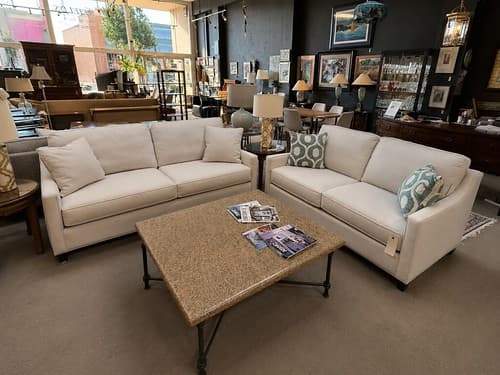 August Wk3 Bassett cream upholstered sofa, Track arm, dark tapered legs, 3-seat - $699
Bassett cream upholstered loveseat, Ttrack arms, dark tapered legs, matching sofa set - $588
Granite and Steel Cocktail Table Blacksmith Babe - $299